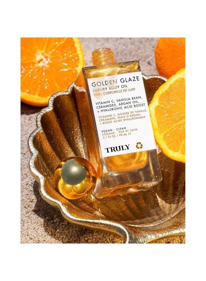 ترولي زيت الجسم الفاخر TRULY Gilded Glow | رائحة دافئة وعطرية خشبية زهرية | ترطيب يدوم طويلاً مع لمعان ذهبي | زيت جسم مضيء للحفلات والمواعيد - Image 2